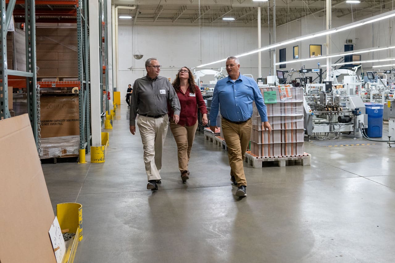 Workers walking in a warehouse